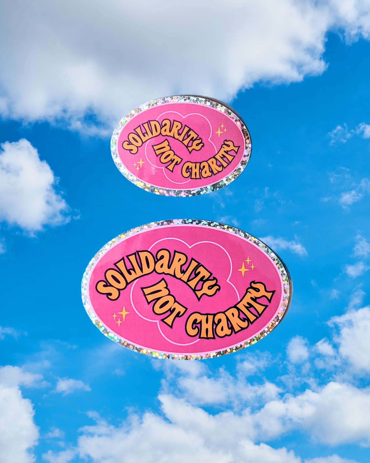 Solidarity Over Charity Glitter Sticker