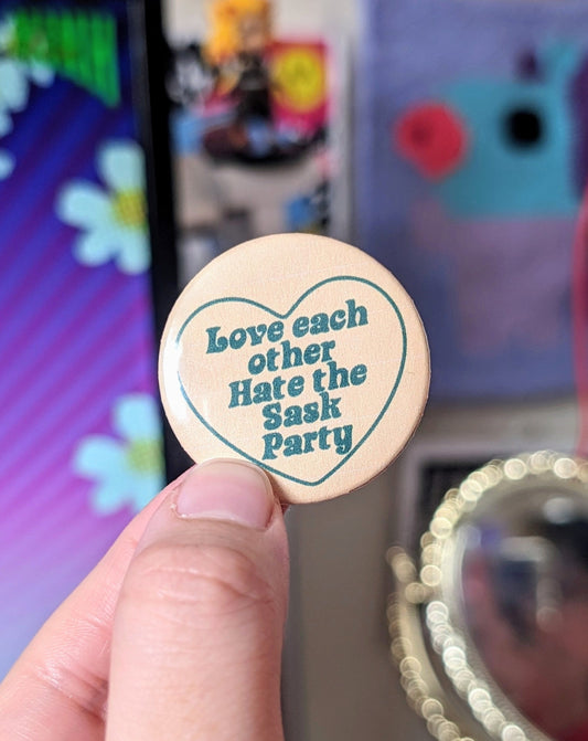 Love Each Other, Hate the Sask Party Button Pins