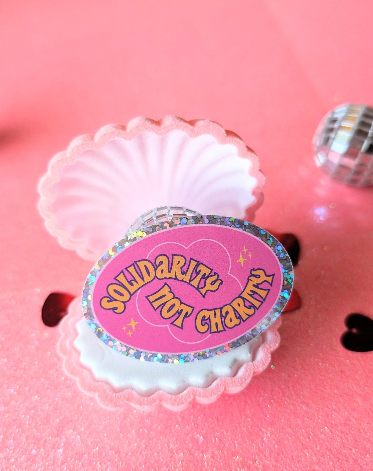 Solidarity Over Charity Glitter Sticker