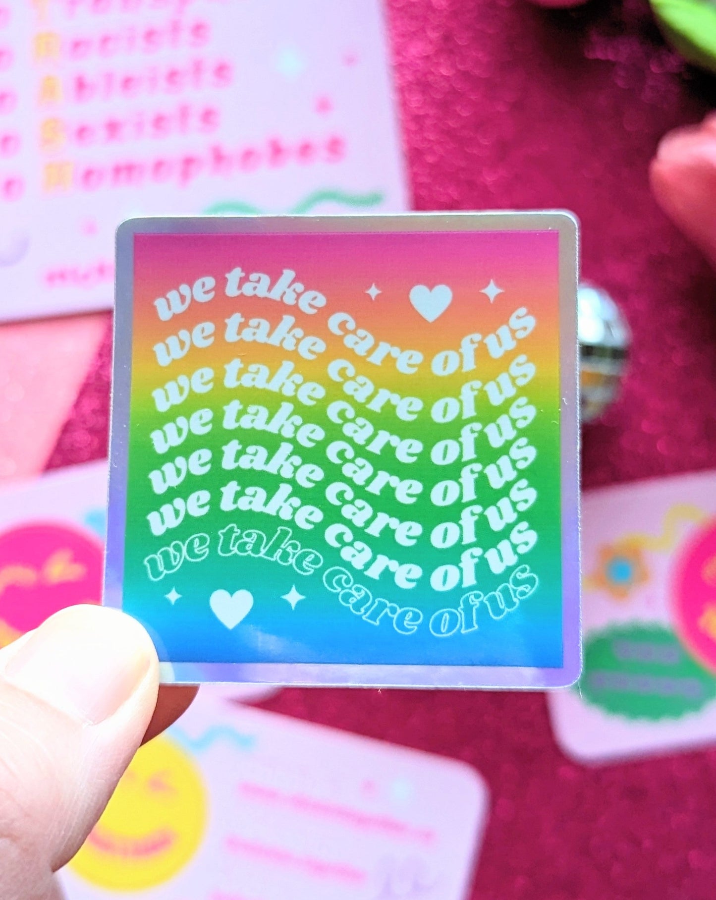 We Take Care of Us Holographic Sticker