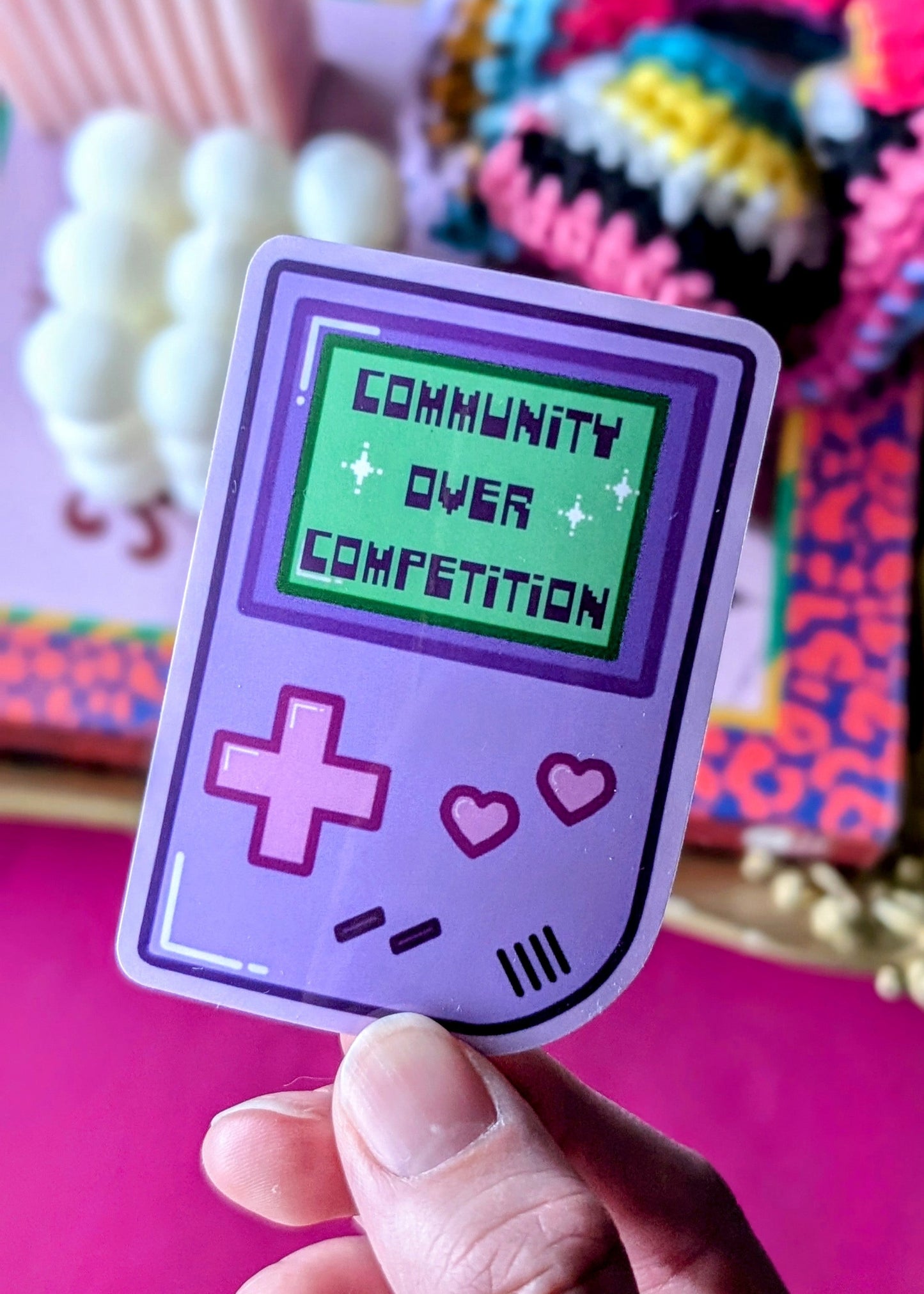 Community Over Competition Sticker
