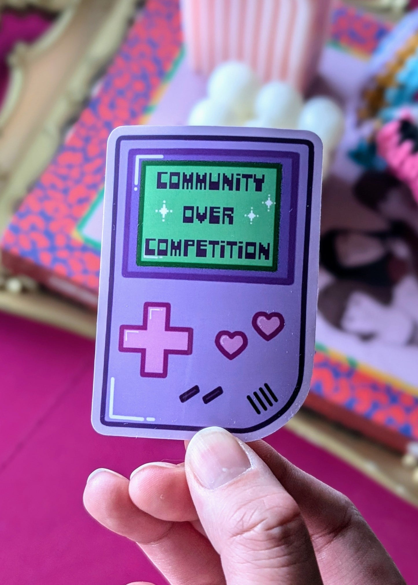 Community Over Competition Sticker