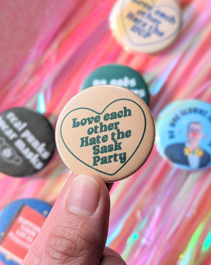 Love Each Other, Hate the Sask Party Button Pins